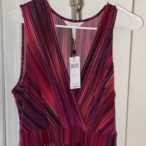 A burgundy strip jumpsuit